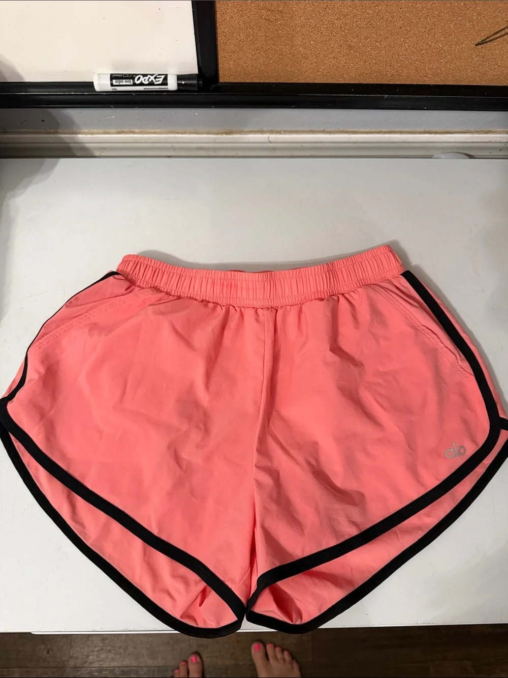 ALO Yoga Coral-Pink Ivy League Dolphin Athletic Shorts with Black Trim